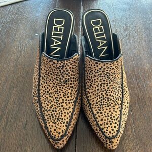 Deltan leather sole, cheetah print calf hair slip on mules